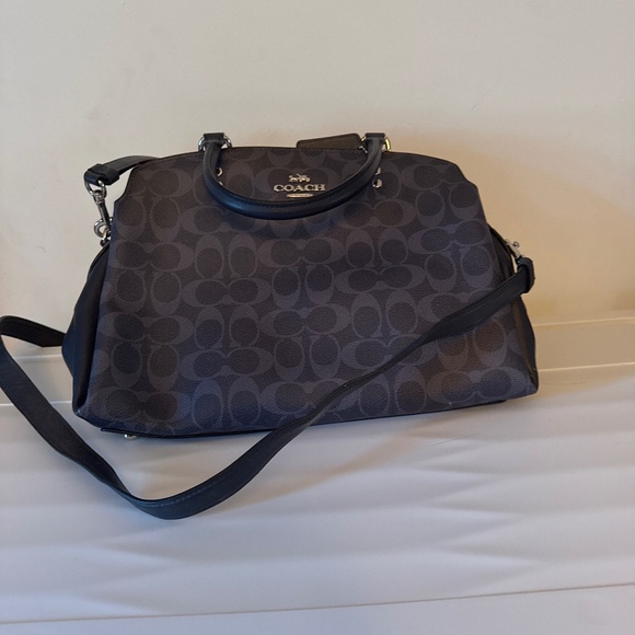 Coach Handbags - just to small for me.